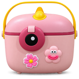 A pink plastic storage container with a yellow handle, featuring a circular front opening with a black center, a pink flower decoration, and a smiling pink cloud decoration on the front.