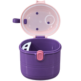 A purple and pink baby feeding container with an open lid, showing a small clear storage cup inside, on a solid white background.